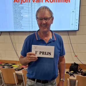 Winnaar Arjon van Kommer met de eerste prijs.