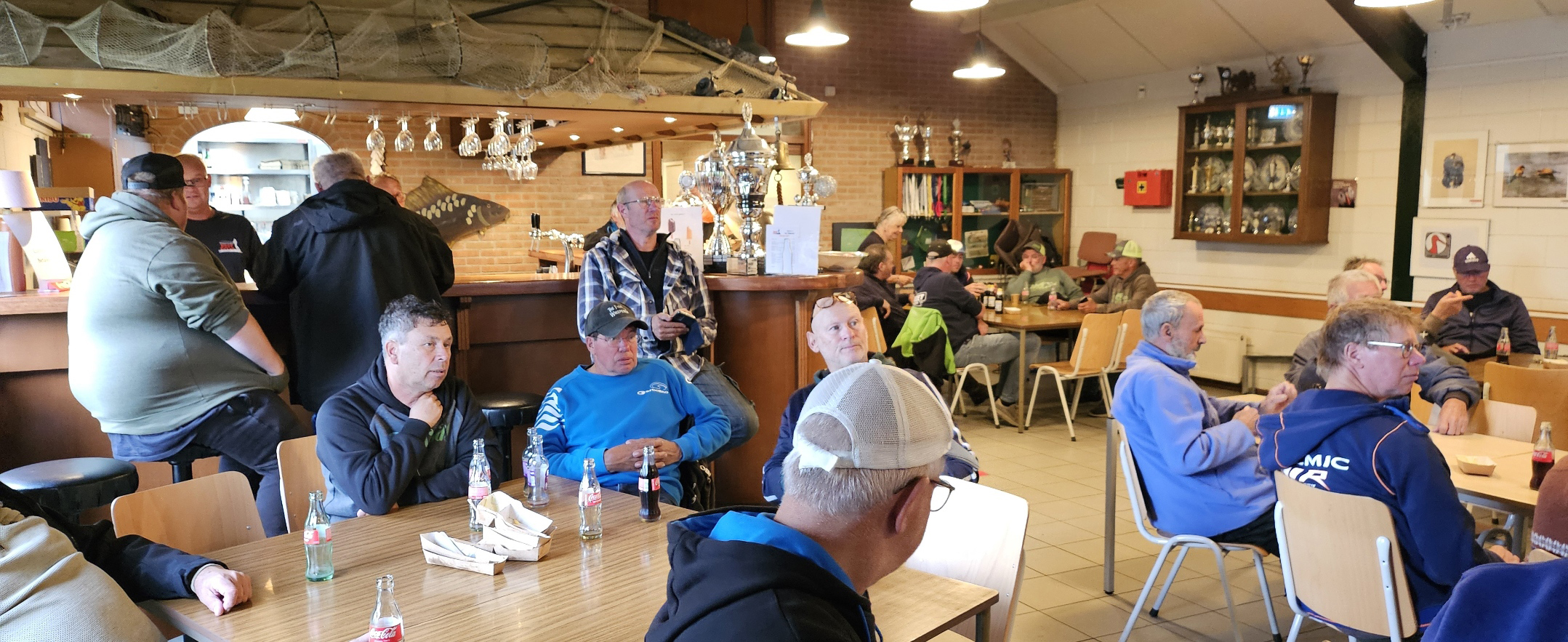 Deelnemers van de Garbolino-koppelwedstrijd samen in het clubhuis.